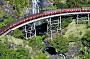 Kuranda Scenic Railway passing Stoney Creek Falls